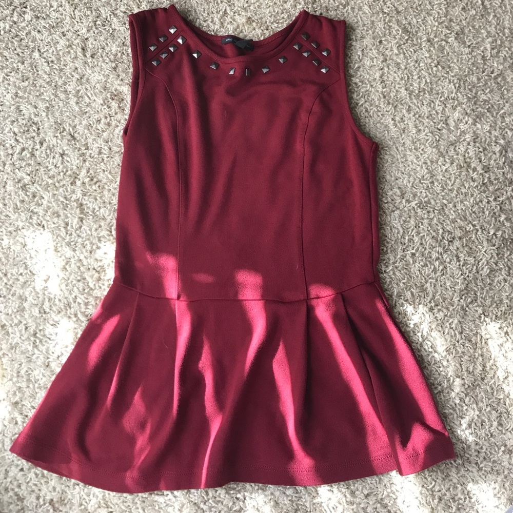 sleeveless flair shirt with metal studs
